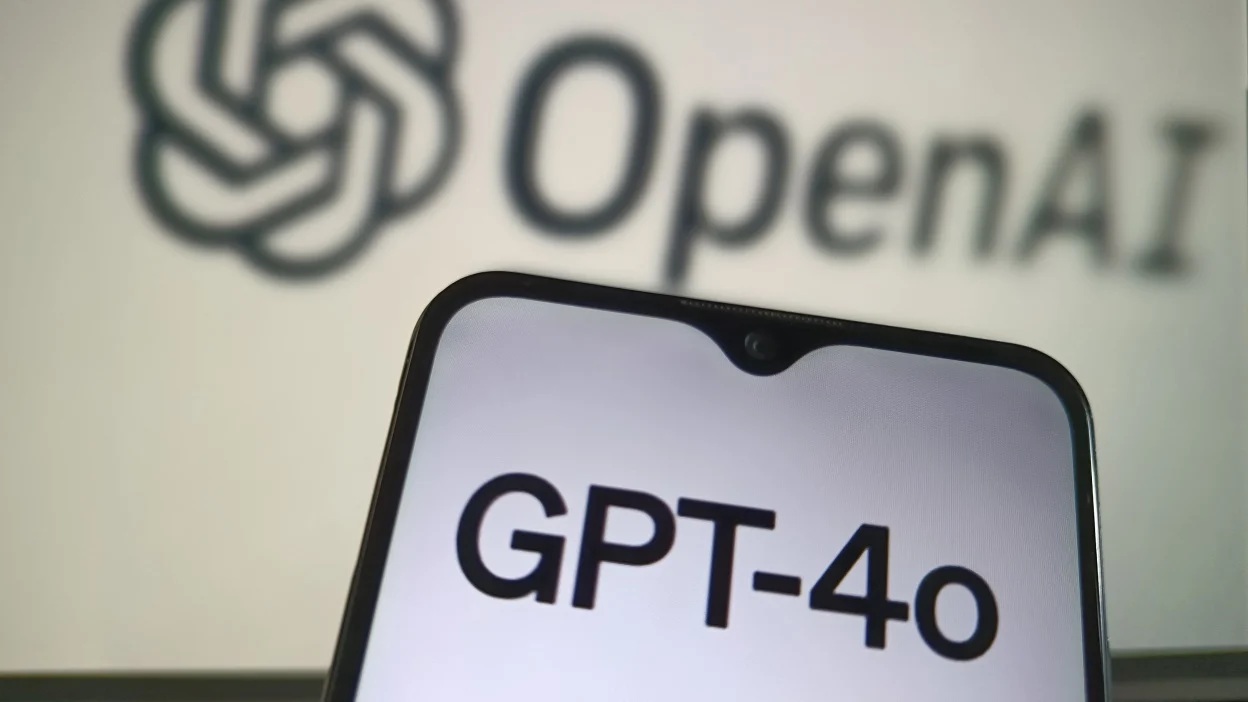 GPT-4o on a phone in front of the OpenAI name